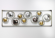 Wanddekoration aus Metall Ranke mit goldenen,silbernen und grauen Kreisen
